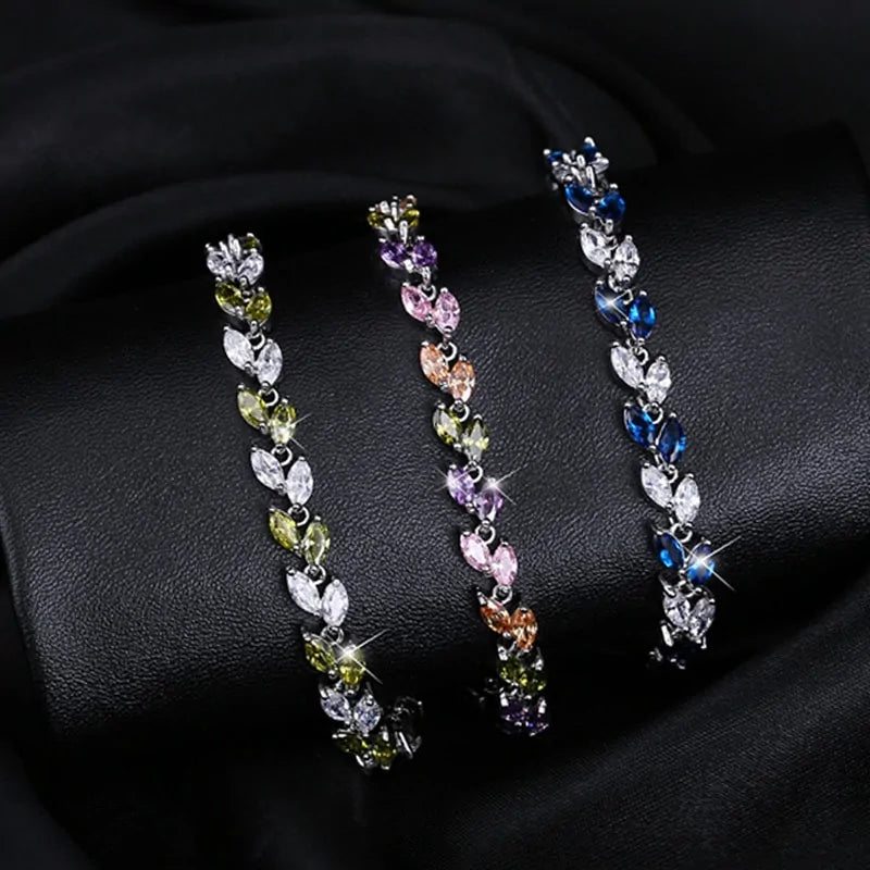 Silver Leaf Colorful CZ Bracelet - Kim’s Signature Beauty & Accessories    (Store description)