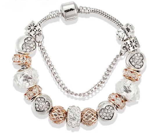 Rose Gold Heart Charm Bracelet - Kim’s Signature Beauty & Accessories    (Store description)