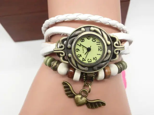 Vintage flying heart pendant bracelet watch - Kim’s Signature Beauty & Accessories    (Store description)