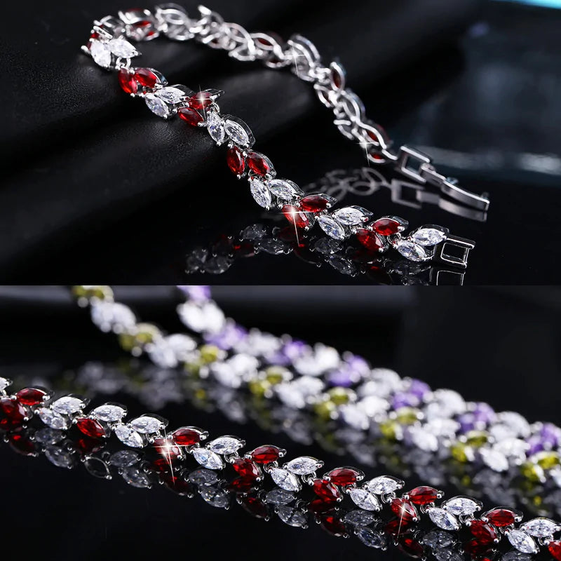 Silver Leaf Colorful CZ Bracelet - Kim’s Signature Beauty & Accessories    (Store description)