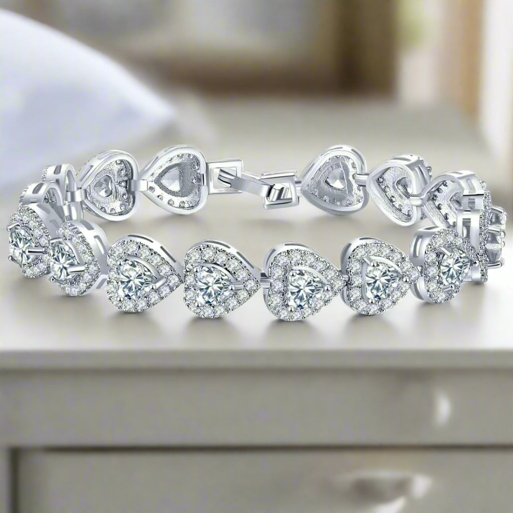 Sterling Silver Heart Bracelet - Kim’s Signature Beauty & Accessories    (Store description)