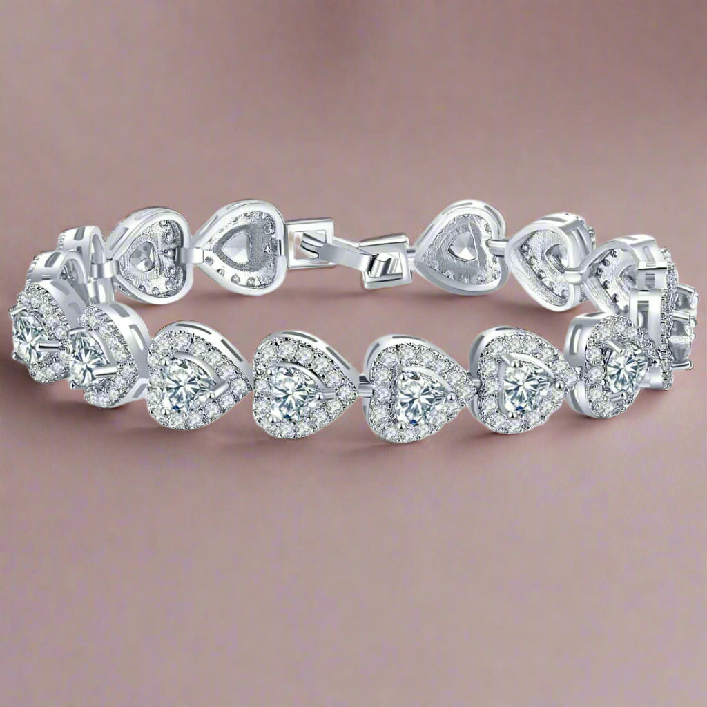 Sterling Silver Heart Bracelet - Kim’s Signature Beauty & Accessories    (Store description)